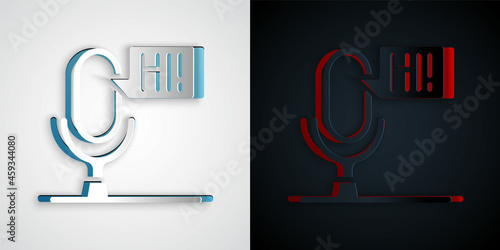 Paper cut Microphone voice device icon isolated on grey and black background. Microphone interpreter and alphabet letters. Paper art style. Vector