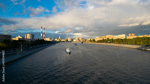 Moscow river after rain rainbow in the sky