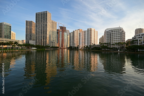 City of Miami, Florida skyline reflected in still water of Biscayne Bay at sunrise. © Francisco