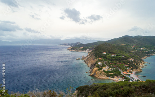 Eastern part of the little peninsula of Monte Enfola in Elba island, Italy with the Sansone beach in the back ground