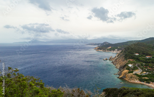Eastern part of the little peninsula of Monte Enfola in Elba island, Italy with the Sansone beach in the back ground
