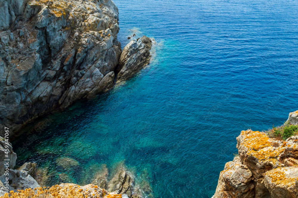 Wild sea landscape with white rocks and blue water in Monte Enfola, Elba island, Italy Wild sea landscape with white rocks and blue water in Monte Enfola, Elba island, Italy