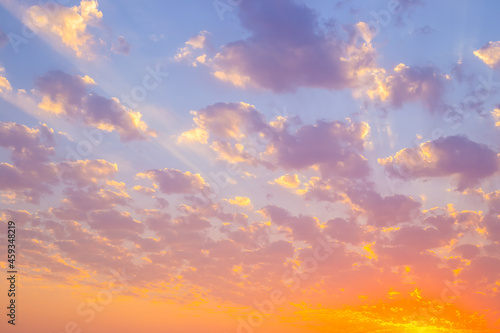 Bright sky with clouds at sunset. Beautiful cloudy landscape