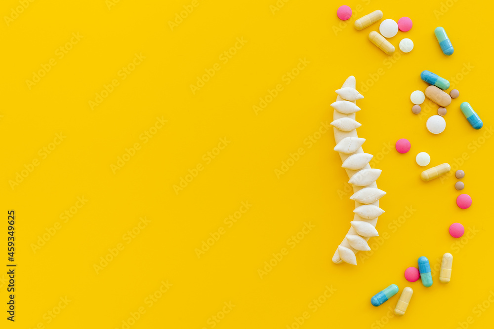 Strong healthy spine with medicine pills. Top view