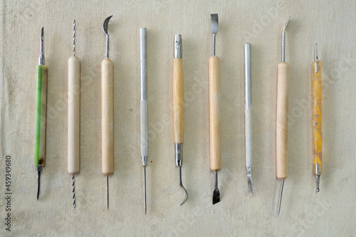 Pottery craft tools for sculpting clay art. View from above 