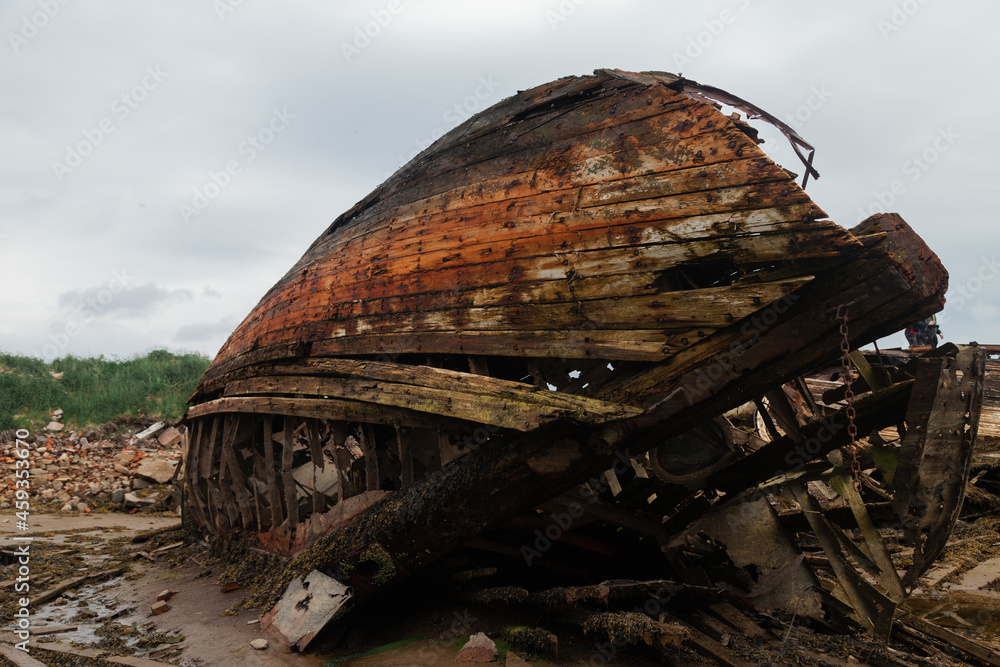 The cemetery of abandoned ancient ships. Destroyed wooden ships The cemetery of abandoned ancient ships. Destroyed wooden ships