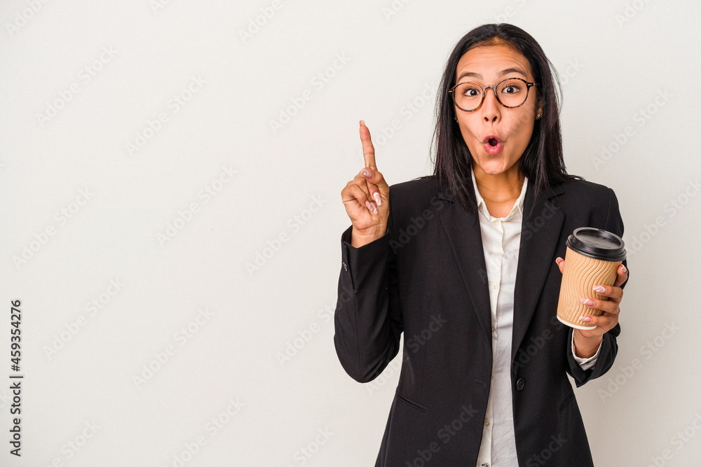 Young business latin woman holding a take away coffee isolated on white background having some great idea, concept of creativity. Young business latin woman holding a take away coffee isolated on white background having some great idea, concept of creativity.