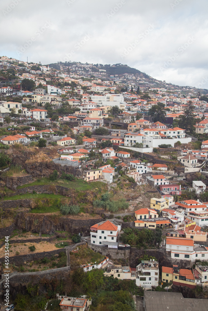 Aerial Shot of hill full of buildings at Funchal in Madeira Island