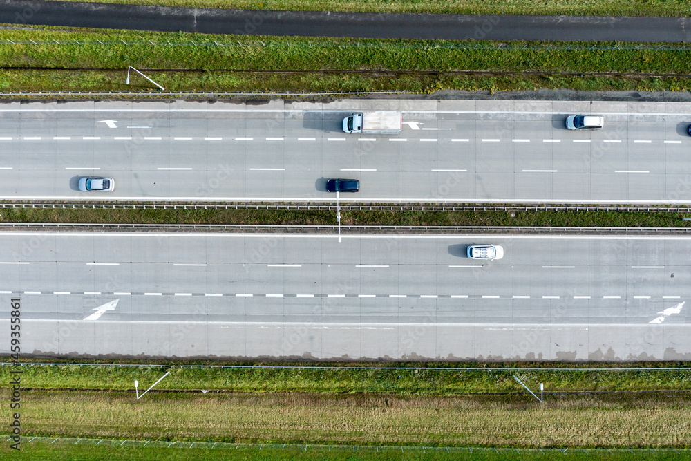 Aerial view of the freeway with various connections. Vehicles travel on the roads. Modern roads Poland
