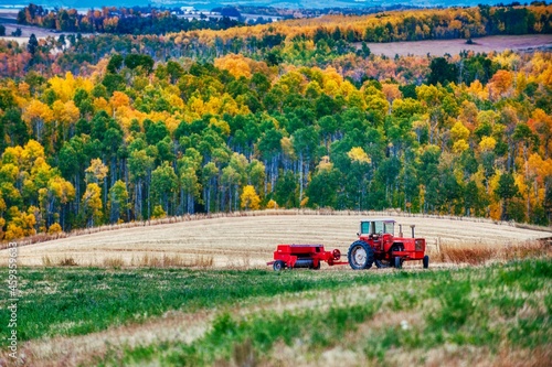 red tractor in fall field