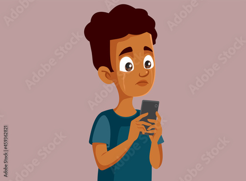 Upset Teen Boy Reading Hateful Comments