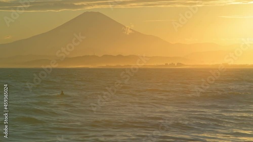 Stock footage of Mount Fuji at sunset from the beach, Enoshima, Japan