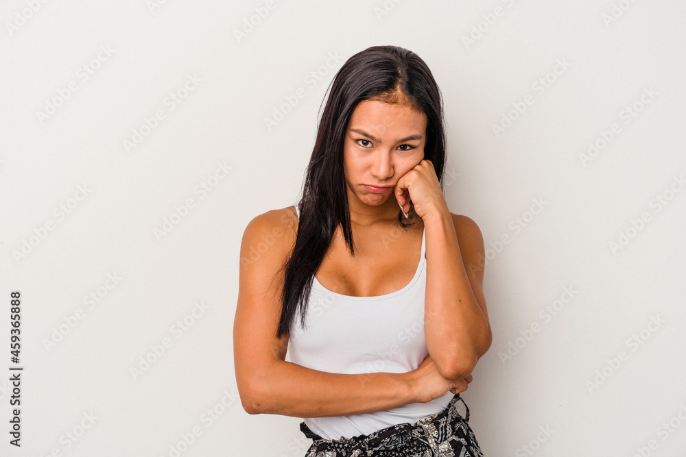 Young latin woman isolated on white background who feels sad and pensive, looking at copy space. Young latin woman isolated on white background who feels sad and pensive, looking at copy space.