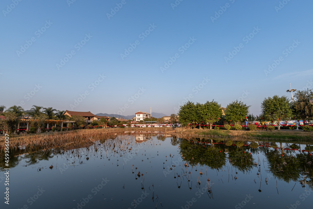 The lake in autumn reflects the scenery on both sides The lake in autumn reflects the scenery on both sides