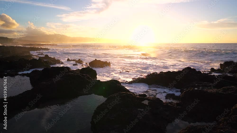 Vibrant sunset and crashing waves at sharks cove Hawaii. Vibrant sunset and crashing waves at sharks cove Hawaii.
