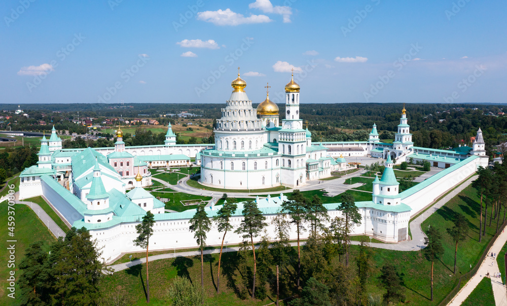 Fototapeta premium Picturesque summer aerial view of major monastery of Russian Orthodox Church in Moscow region, Resurrection Monastery located in historic area of Istra town..