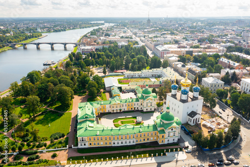 Aerial view of modern Tver cityscape overlooking Transfiguration Cathedral and Imperial Traveling Palace on bank of Volga river on sunny summer day, Russia photo