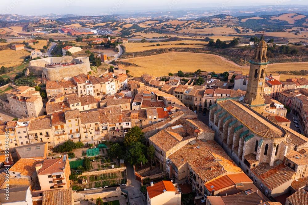 Aerial view of mediaeval town Calaf on sunny day, Province of Barcelona, Spain