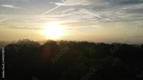 Wallpaper Mural A drone rising through foggy cloud cover to reveal a sunrise. 4k 30fps Torontodigital.ca