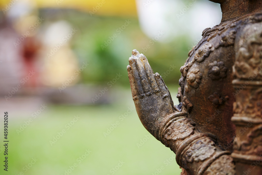 Ancient Buddha statue, closeup. In a quiet and comfortable natural environment Ancient Buddha statue, closeup. In a quiet and comfortable natural environment