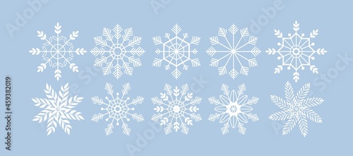 Snowflake silhouette vector set. Christmas and New Year holidays elements for greeting card. Winter line style isolated illustration. White Snowflakes icon. Crystal snow logo on blue
