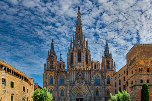 Gothic cathedral in Barcelona under cloudy sky