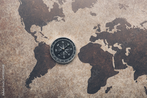 Old compass on vintage worl...