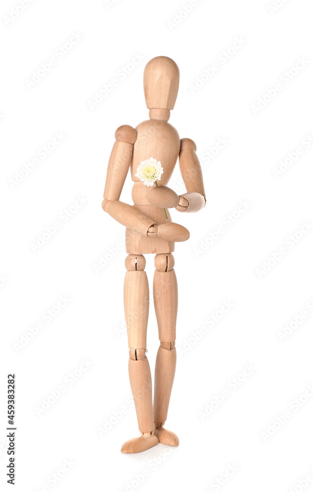 Wooden mannequin with flower on white background Wooden mannequin with flower on white background