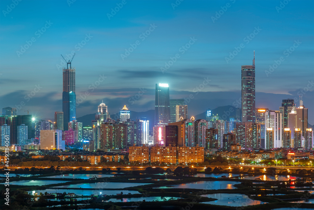 Fototapeta premium Night scenery of panorama of skyline of Shenzhen city, China. Viewed from Hong Kong border