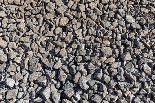 Fotografie Beautiful texture of gray quartz crystal rough stones