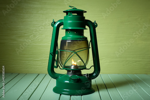 Stylish retro lamp on color...