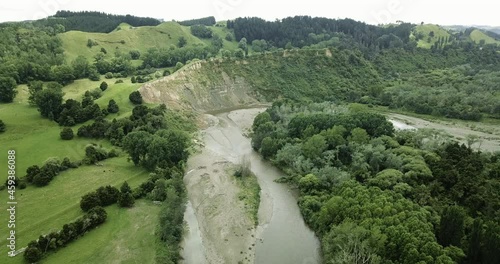 Aerial of verdant river cliffs in Spring - Totara Reserve, New Zealand photo