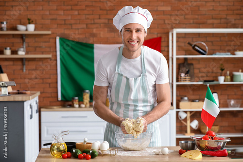 Italian chef making dough i...
