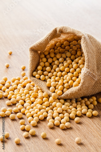 close up of soy beans overflow bag background.