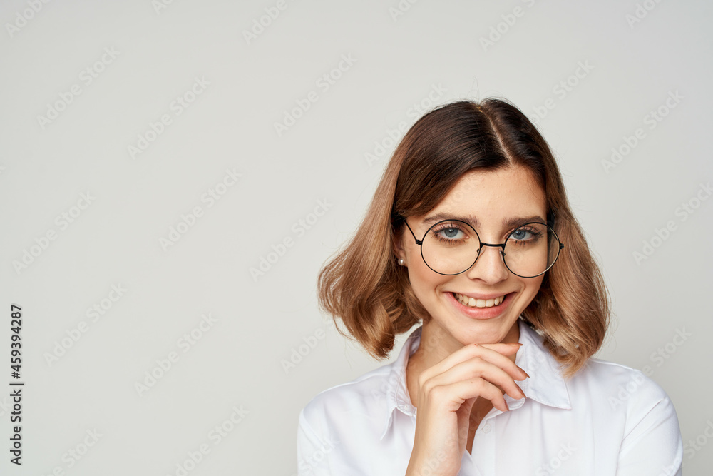 Business woman in white shirt wearing glasses office professional Business woman in white shirt wearing glasses office professional