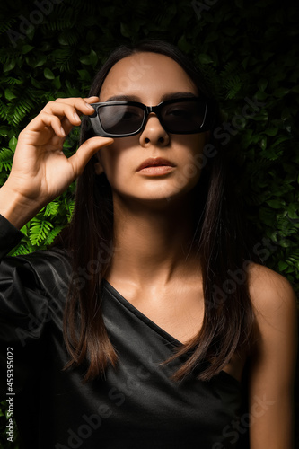 Young woman wearing stylish...