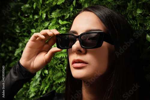 Young woman wearing stylish...