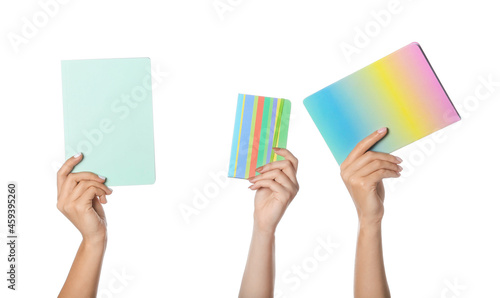 Female hands with different notebooks on white background