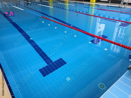  a large, clean and new swimming pool in the educational institution. Swimming tracks and clear water, everything is ready for the competition. Curbstones, pedestals for diving into the water