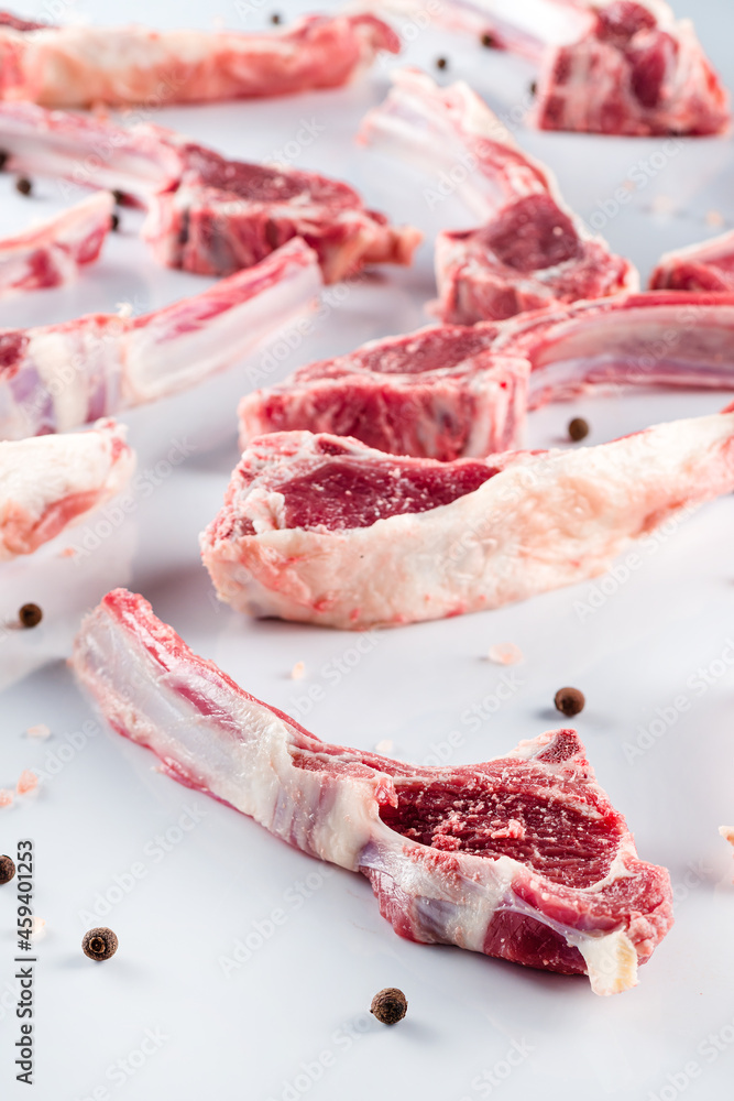 raw lamb ribs on a light background raw lamb ribs on a light background