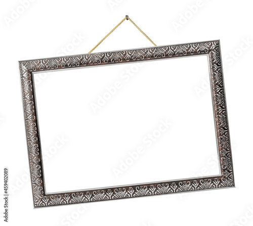 Obraz na płótnie Old silver picture frame hanging on a rope w salonie