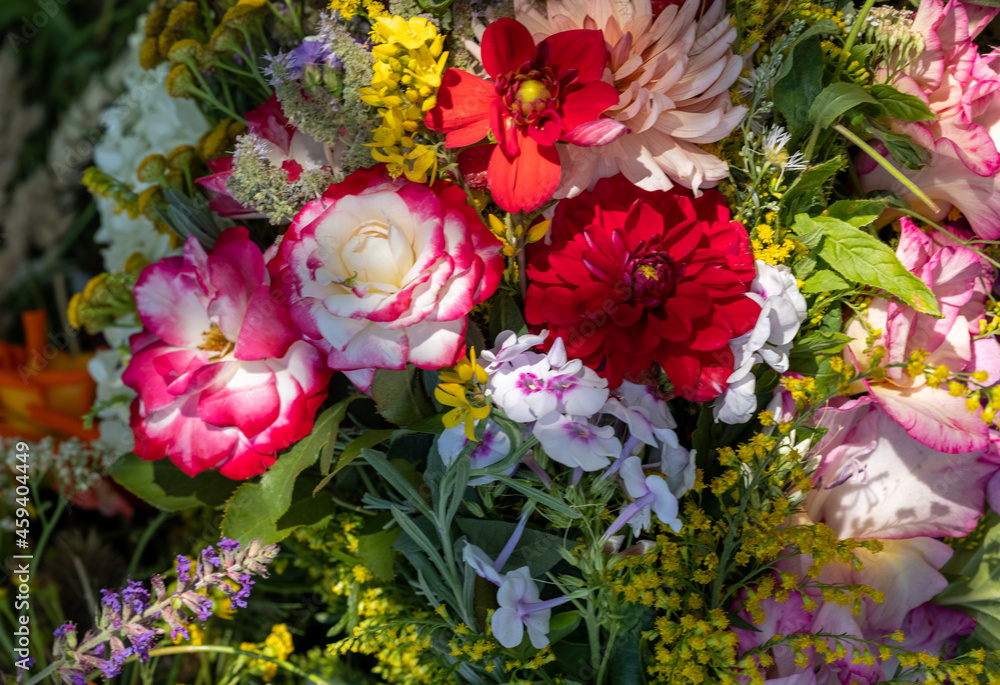 Obraz premium Traditional bouquet of flowers, herbs and fruits that are the symbol of summer