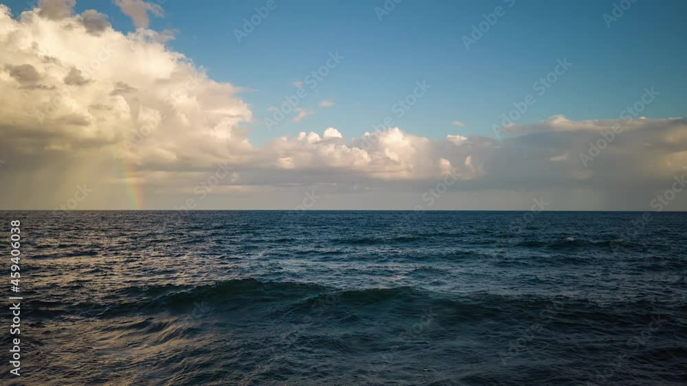 The clouds and the rainbow gave the final touch to this impressive timelapse over the Caribbean Sea. Santo Domingo Dominican Republic. The clouds and the rainbow gave the final touch to this impressive timelapse over the Caribbean Sea. Santo Domingo Dominican Republic.