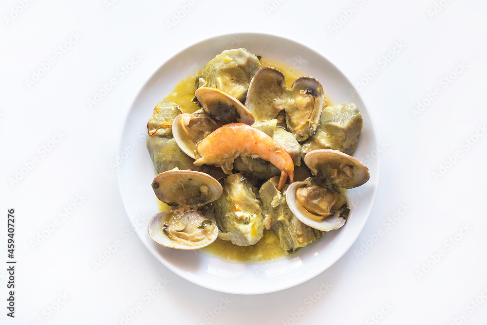 Artichokes a la marinera, typical Christmas dish in spain Artichokes a la marinera, typical Christmas dish in spain