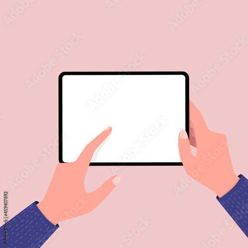 Hands holing tablet computer and pointing on the blank screen. Editable tablet template.