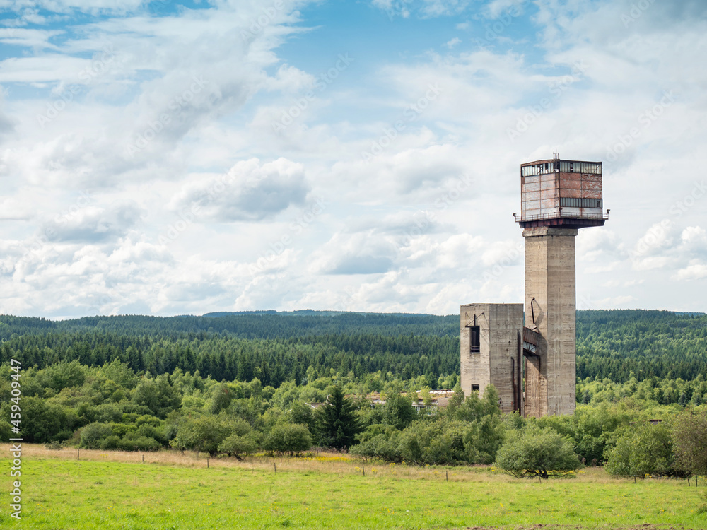 Mine tower and abandoned industrial zone after finished mining Mine tower and abandoned industrial zone after finished mining