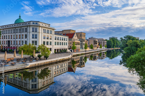 Germany,¬†Brandenburg,¬†Potsdam, City buildings reflecting in Havel river canal