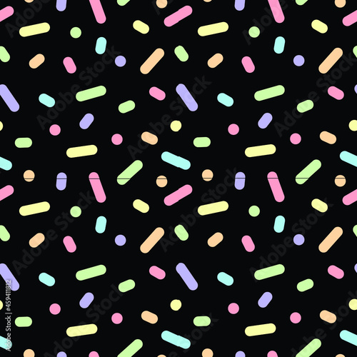 Vector confetti seamless pattern on black background. Sugar sprinkles, topping, donut glaze, sweet decorations or paper confetti background. Rainbow colors. Birthday, party, celepration