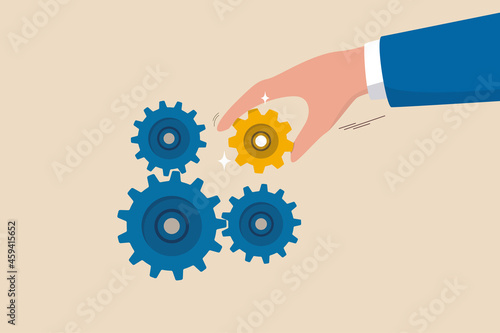 Business solution to fix problem, expertise and skill to drive success, leadership to connect business part strategy concept, businessman hand put important gear or cogwheel to make machine run good.