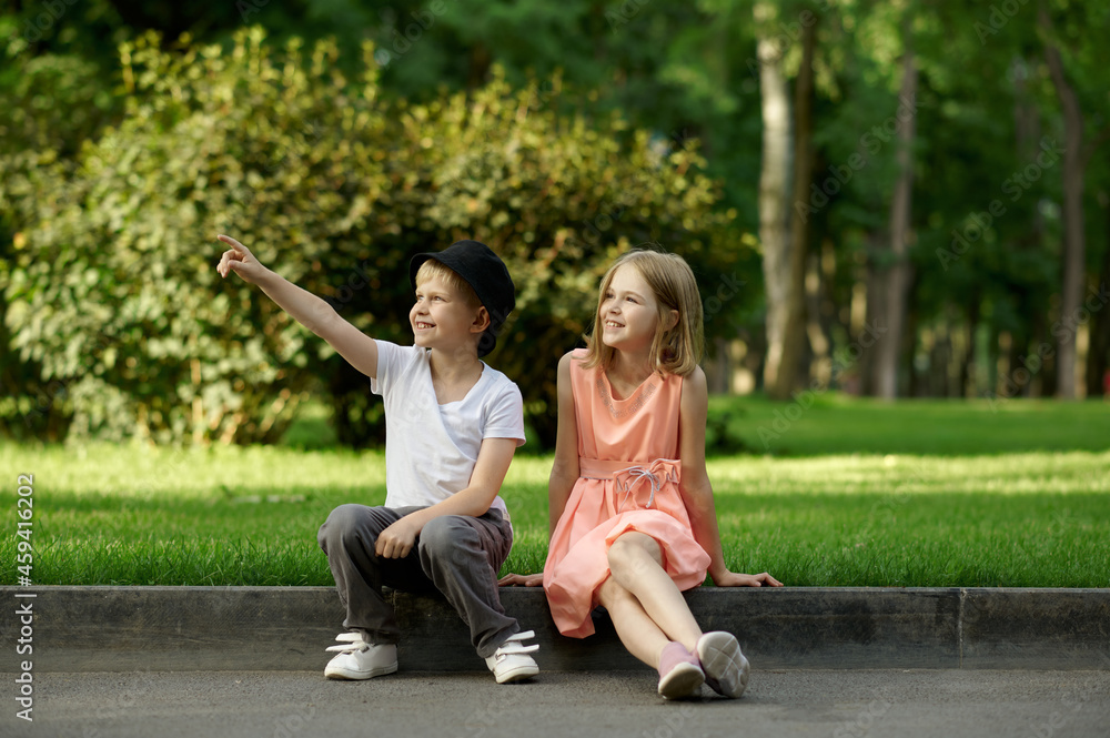 Children's romantic meeting in summer park Children's romantic meeting in summer park